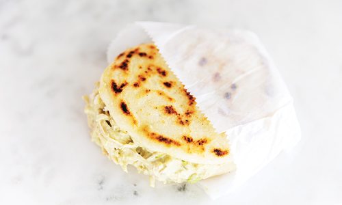 Take a Bite Out of Caracas House's Chicken Avocado Arepas