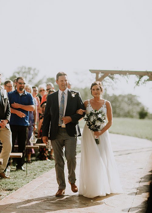 Taylor Abraham and her father on her wedding day