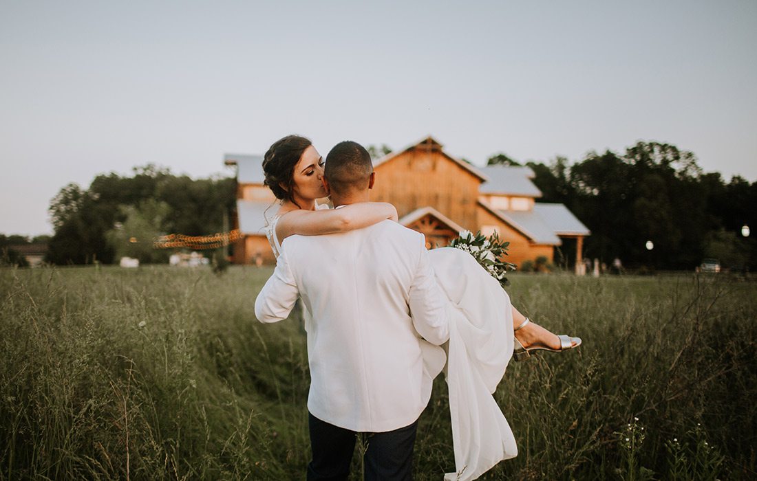 Taylor Abraham & Corey Holmes on their wedding day