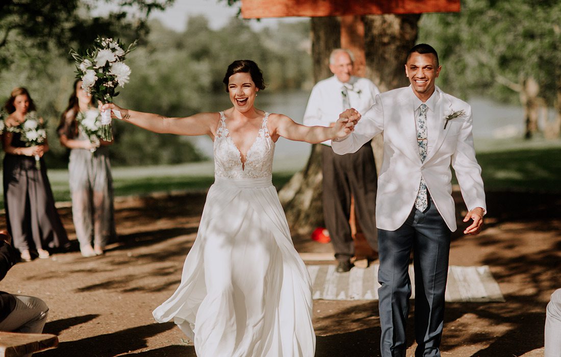 Taylor Abraham & Corey Holmes on their wedding day