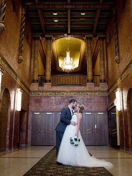 theatre entrance with bride and groom