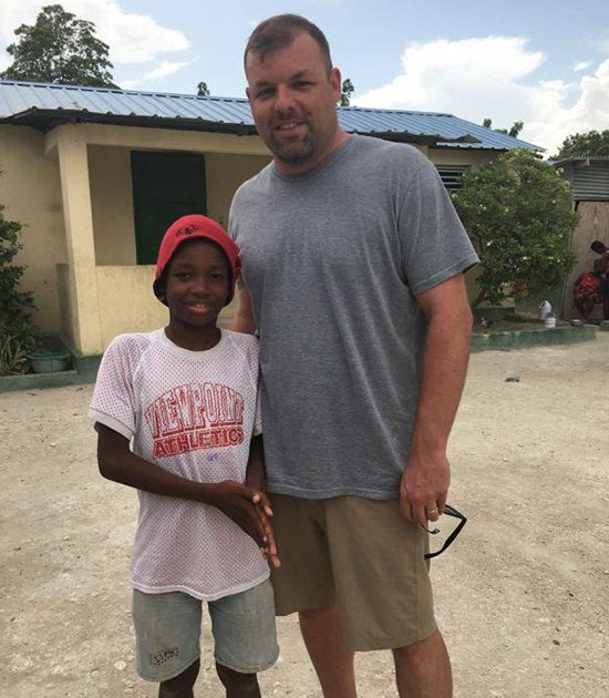 Jason Parke, owner of The Greek Corner Screen Printing and Embroidery, on a trip to Haiti with Allmade Apparel