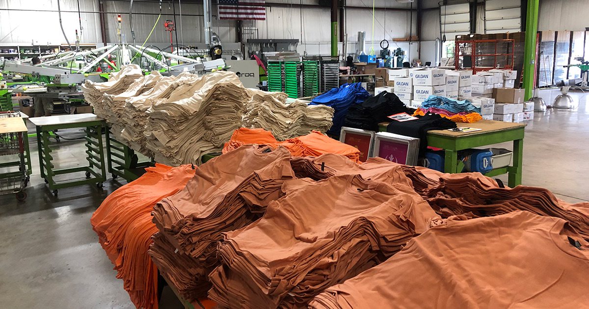 T-shirts waiting for shipping at The Greek Corner Screen Printing and Embroidery Springfield MO