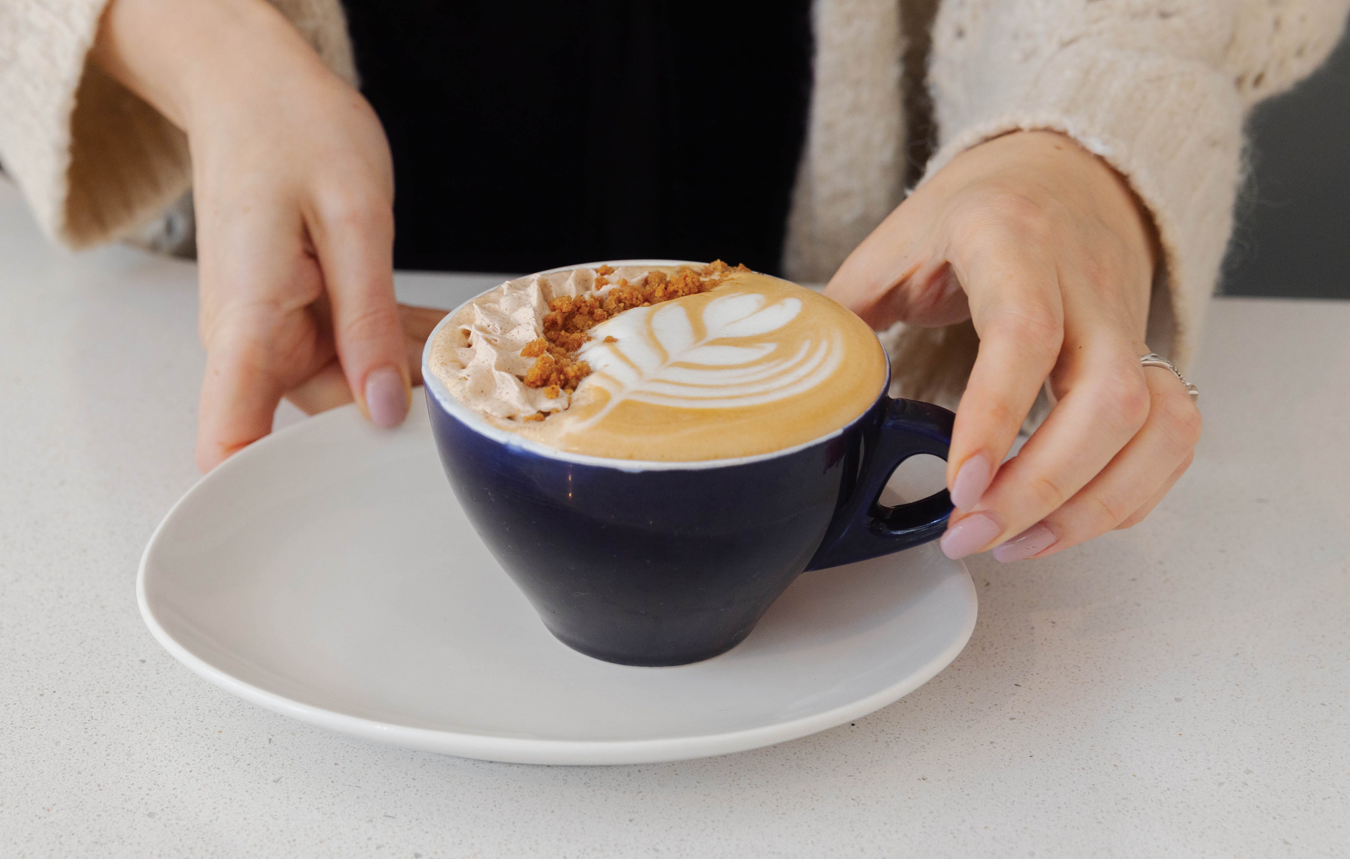 Coffee in a cup set on a table