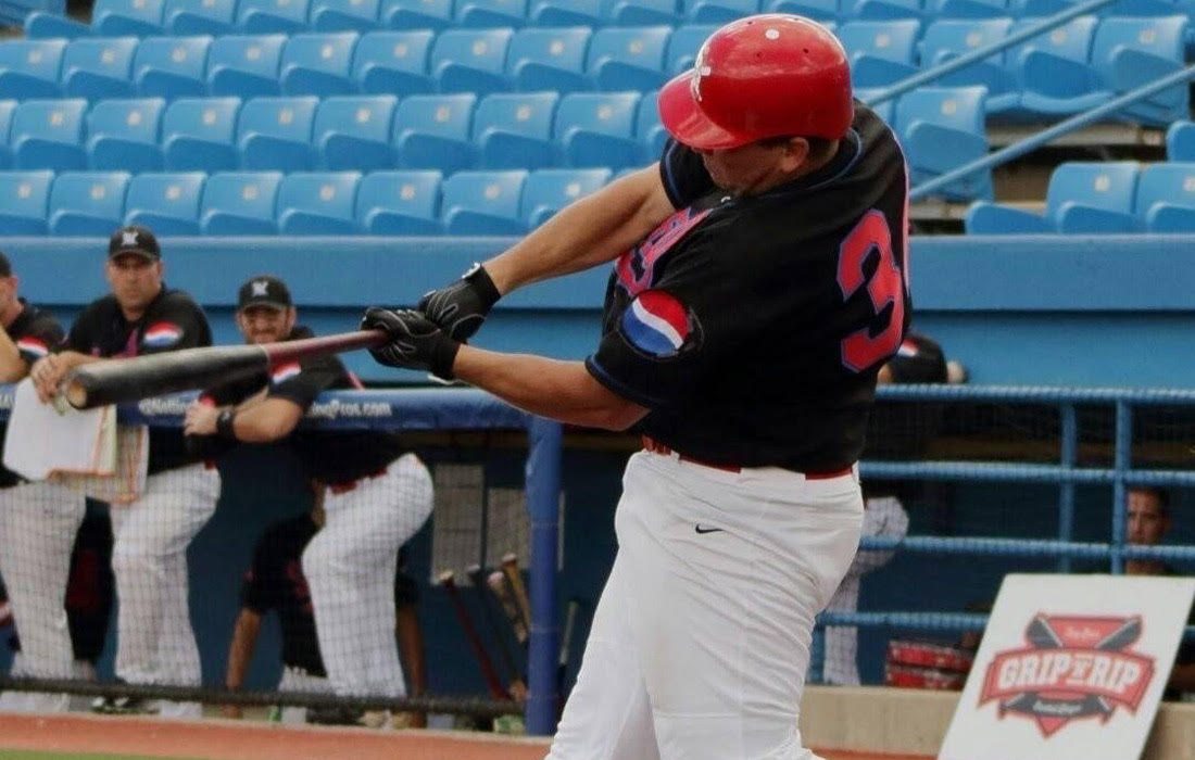 Tony Lewis playing baseball