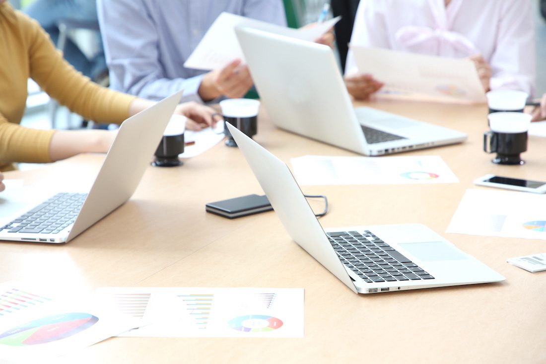 Laptops on a conference table