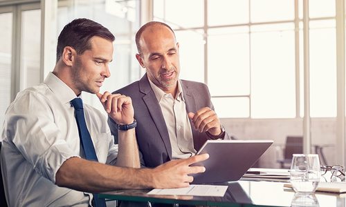 two men working on a project