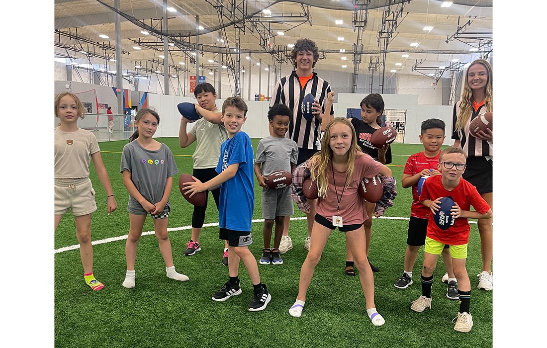 Kids enjoying sports games at Allison Sports Town.