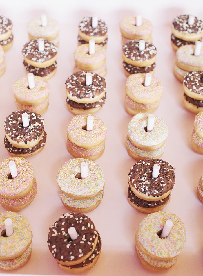 a donut wall at a wedding