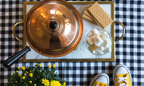 fondue and a checkered floors with yellow converse shoes