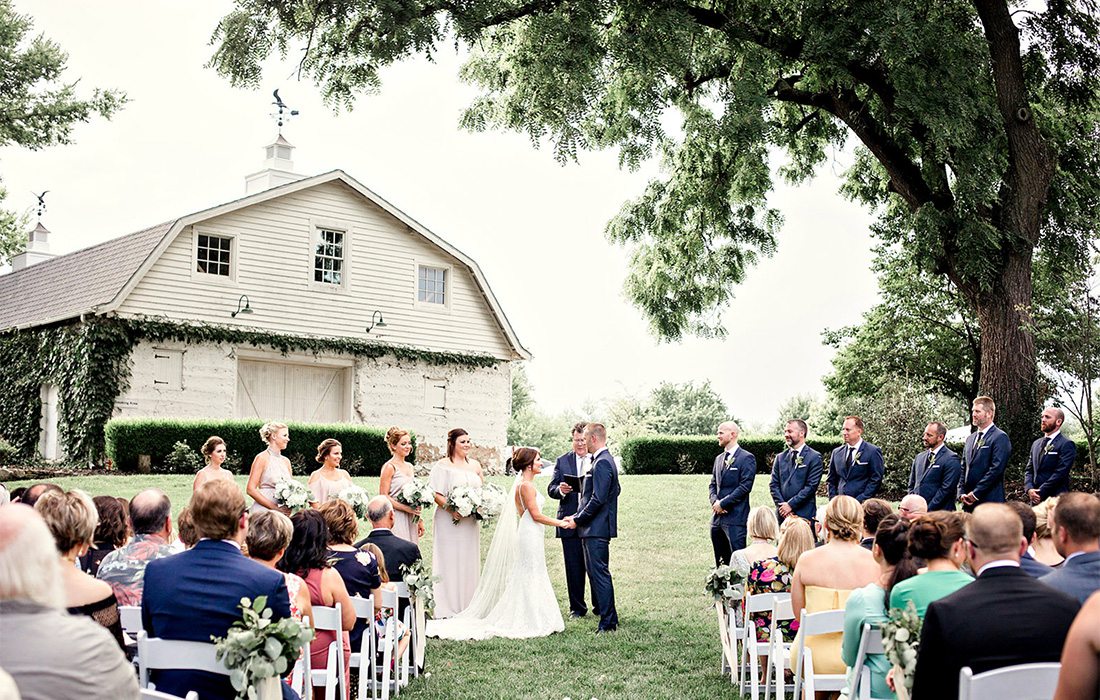 bride and groom during wedding ceremony outside