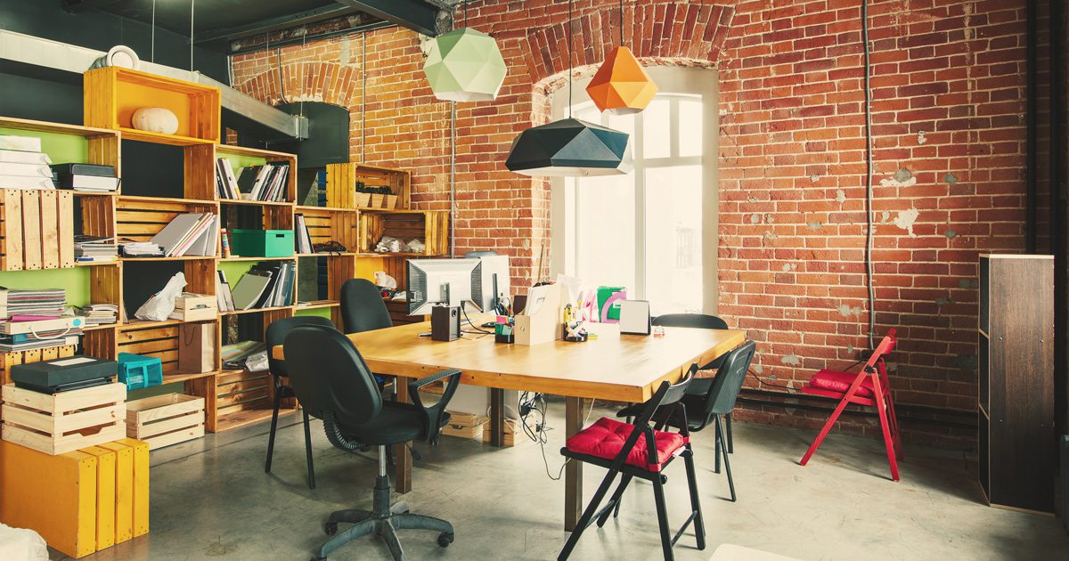 Modern office Interior with old vintage brick Wall. Art work business space.