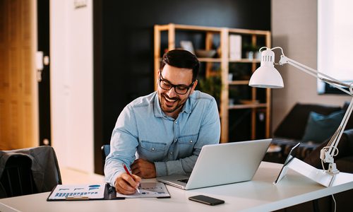 Man working remotely stock photo