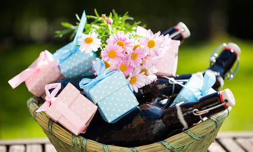 Gift basket with flowers and beer bottles