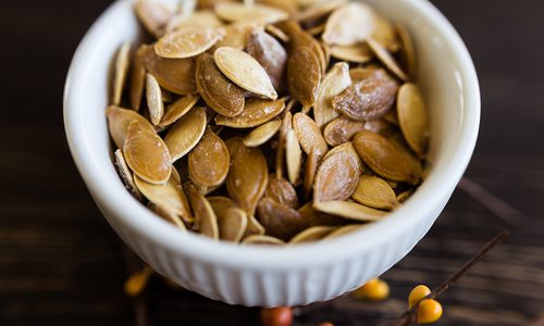 Roasted pumpkin seeds stock photo.