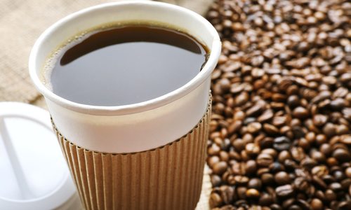 Takeout coffee with coffee beans