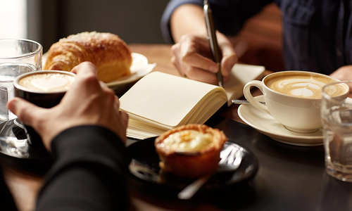 Stock photo of people working at lunch