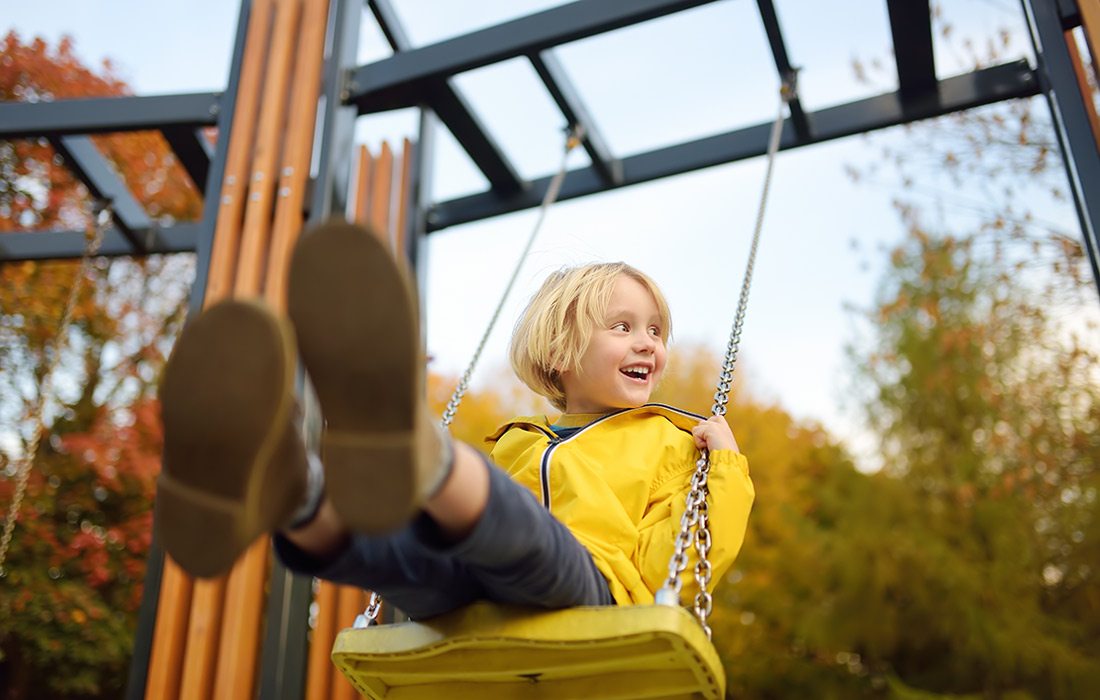 Kid on a swing