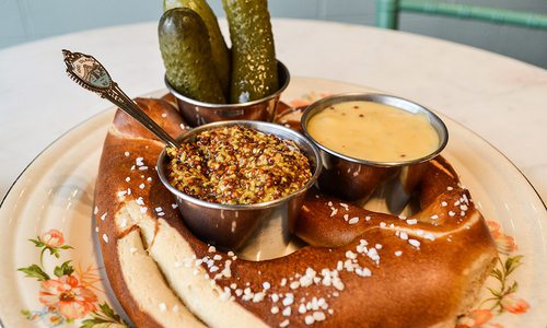 Soft pretzel with mustard at The Royal