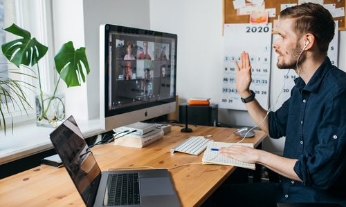 Man working remotely virtual meeting