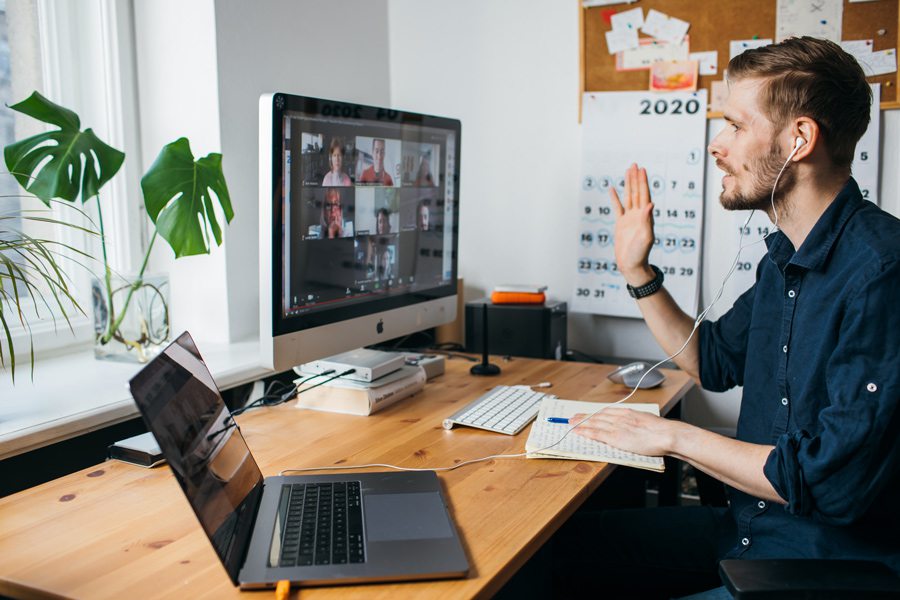 Man working remotely virtual meeting