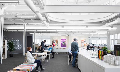 White open office with coffee station