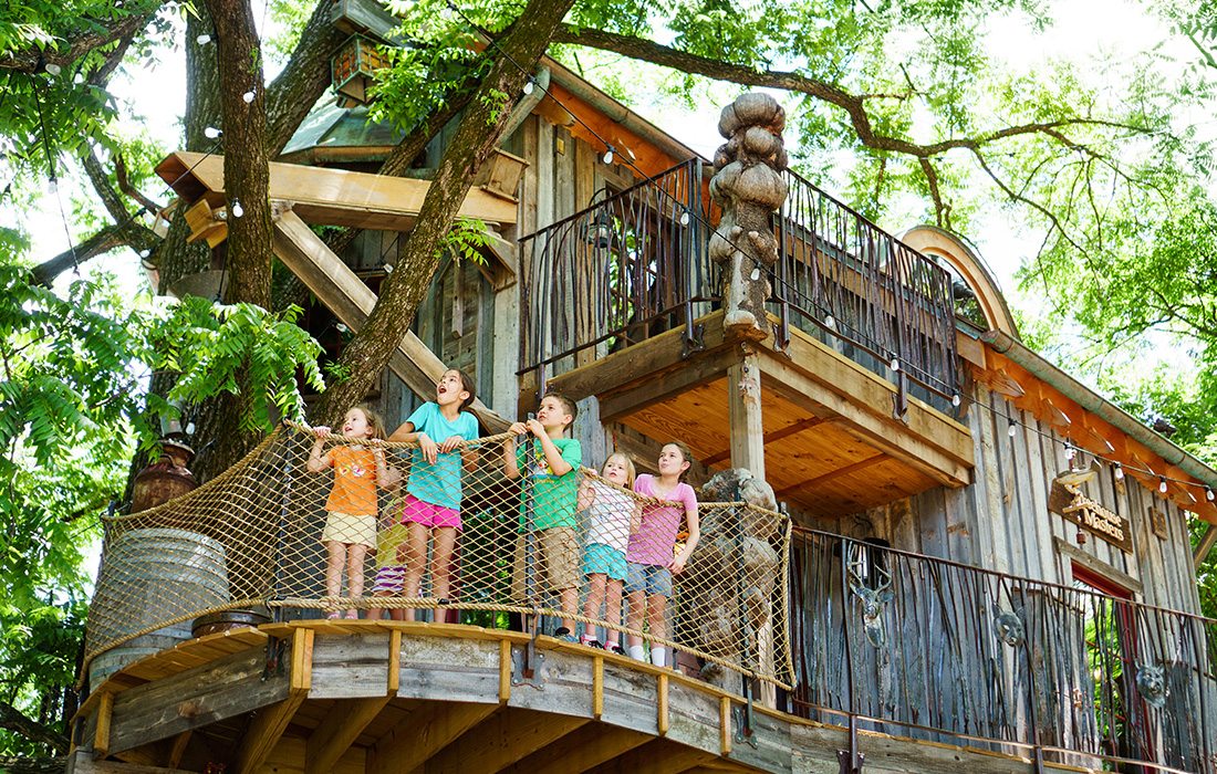 Kids in a treehouse at a summer camp at Dogwood Canyon in Southwest Missouri.